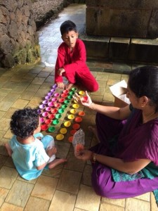 Twitter Update: A family visiting from Malaysia unwrap clay lamps...