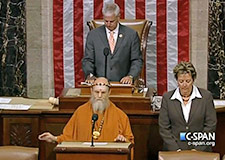 Bodhinatha giving the opening prayer in the House of Representatives