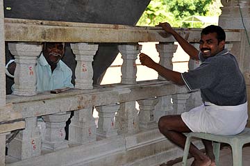 Silpis at work on railing and Floor