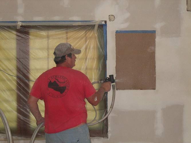After a day of concentrated work. The stucco goes on the walls.