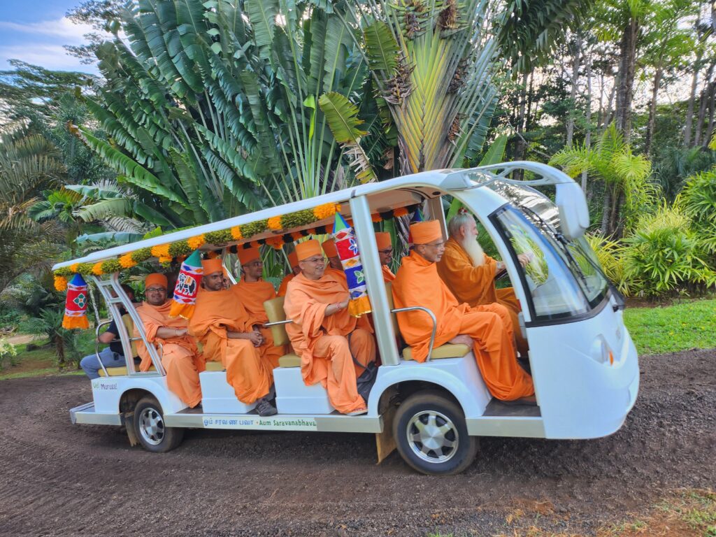 Off to a tour of Siva's Sacred Gardens in our electric chariot, called "Mayil."