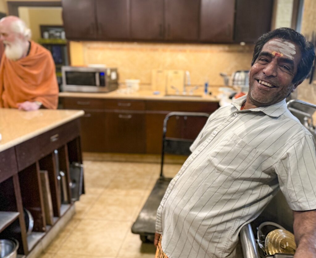 Mani in happy to see the new oven in place